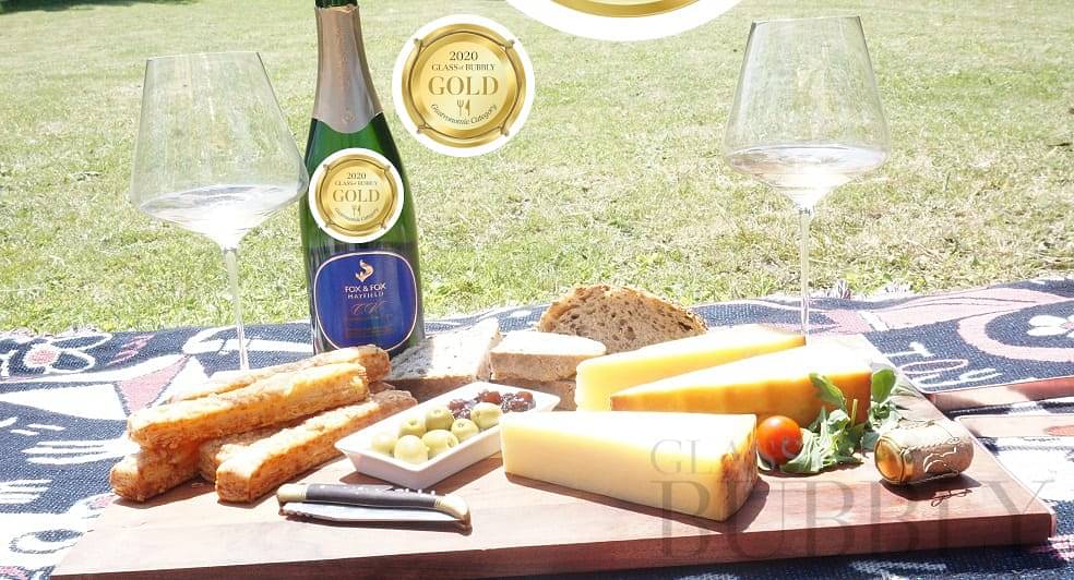 matured to perfection cheddar and fizz glass of bubbly